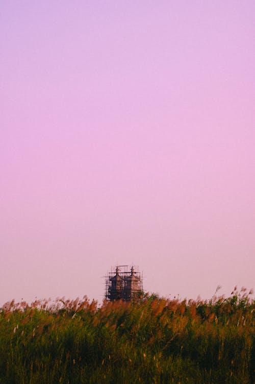 Immagine gratuita di campo, costruzione, crepuscolo