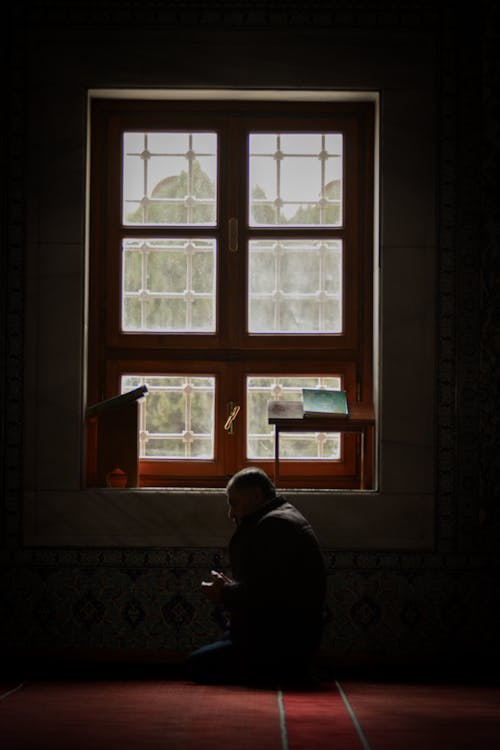 muslim praying in mosque 