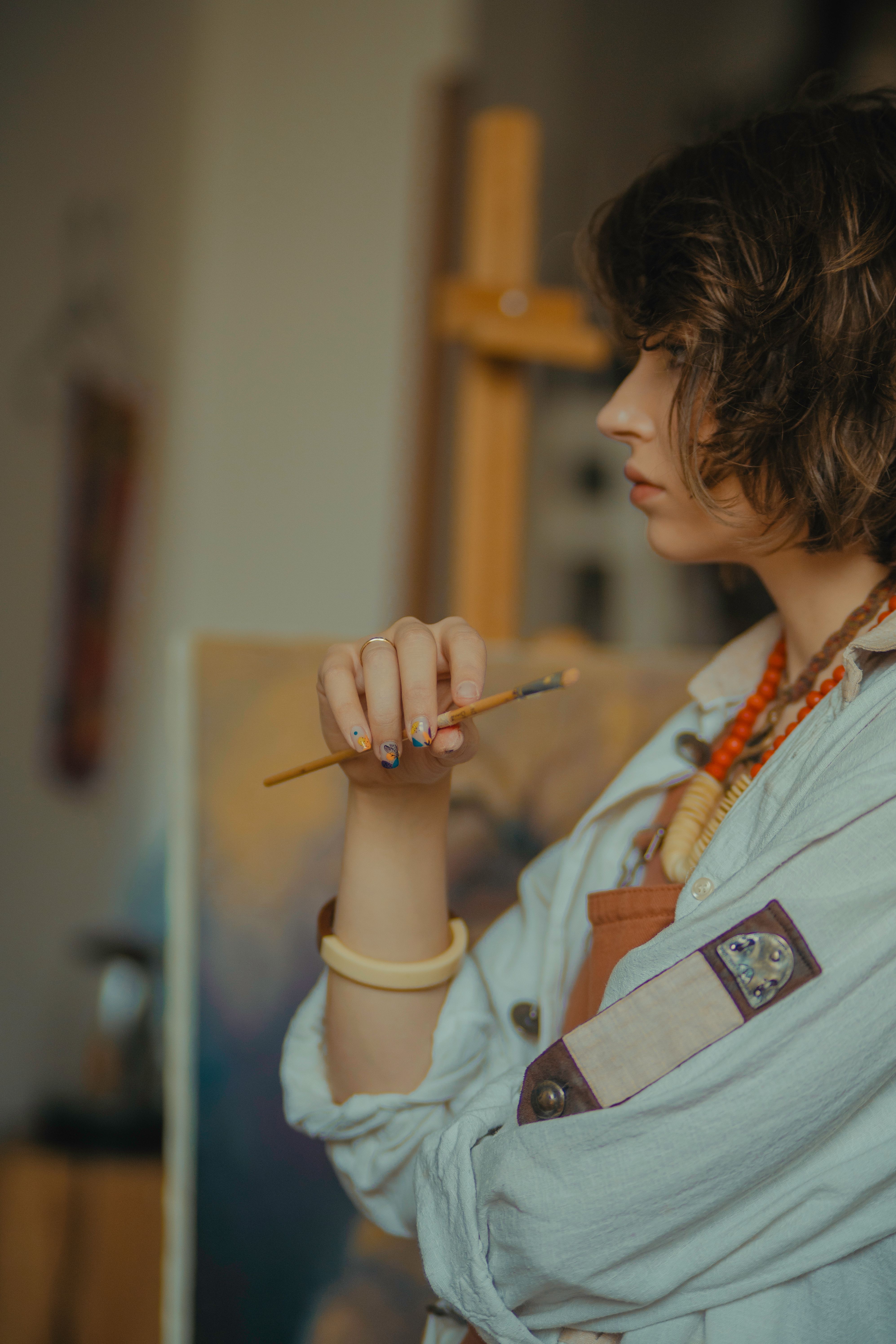 An Artist with a Paintbrush · Free Stock Photo