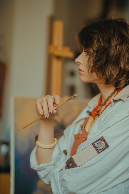 Painterly studio portrait of a woman — photo by Rahib Hamidov on Pexels