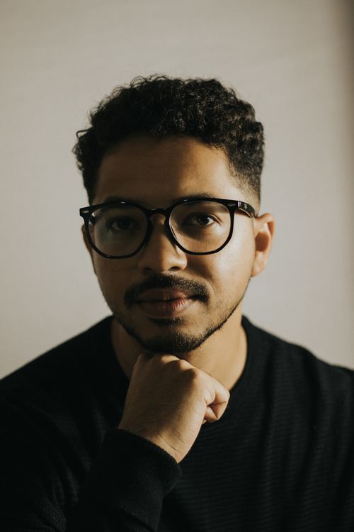 Free Elegant portrait of a handsome young man wearing glasses in São Paulo, Brazil. Stock Photo