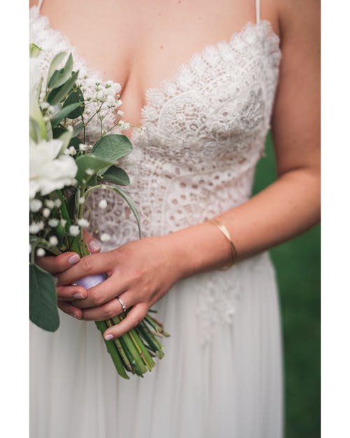 A bride holding a bouquet of flowers