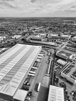Aerial black and white shot of a large industrial warehouse in Hertfordshire, England.