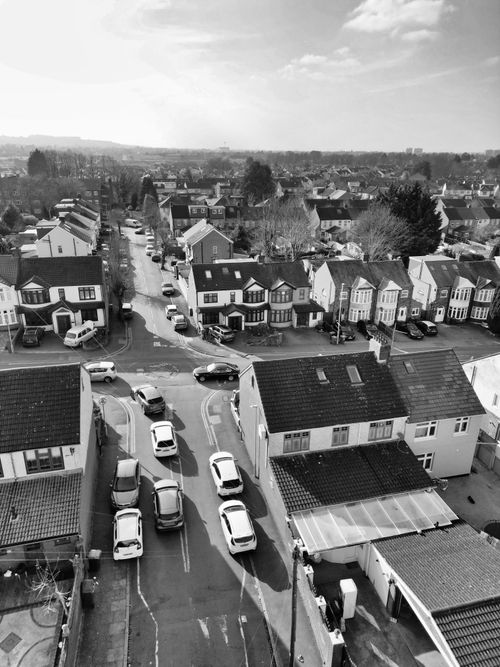 Free A black and white aerial shot of a residential neighborhood in Luton, UK, showcasing streets and houses. Stock Photo