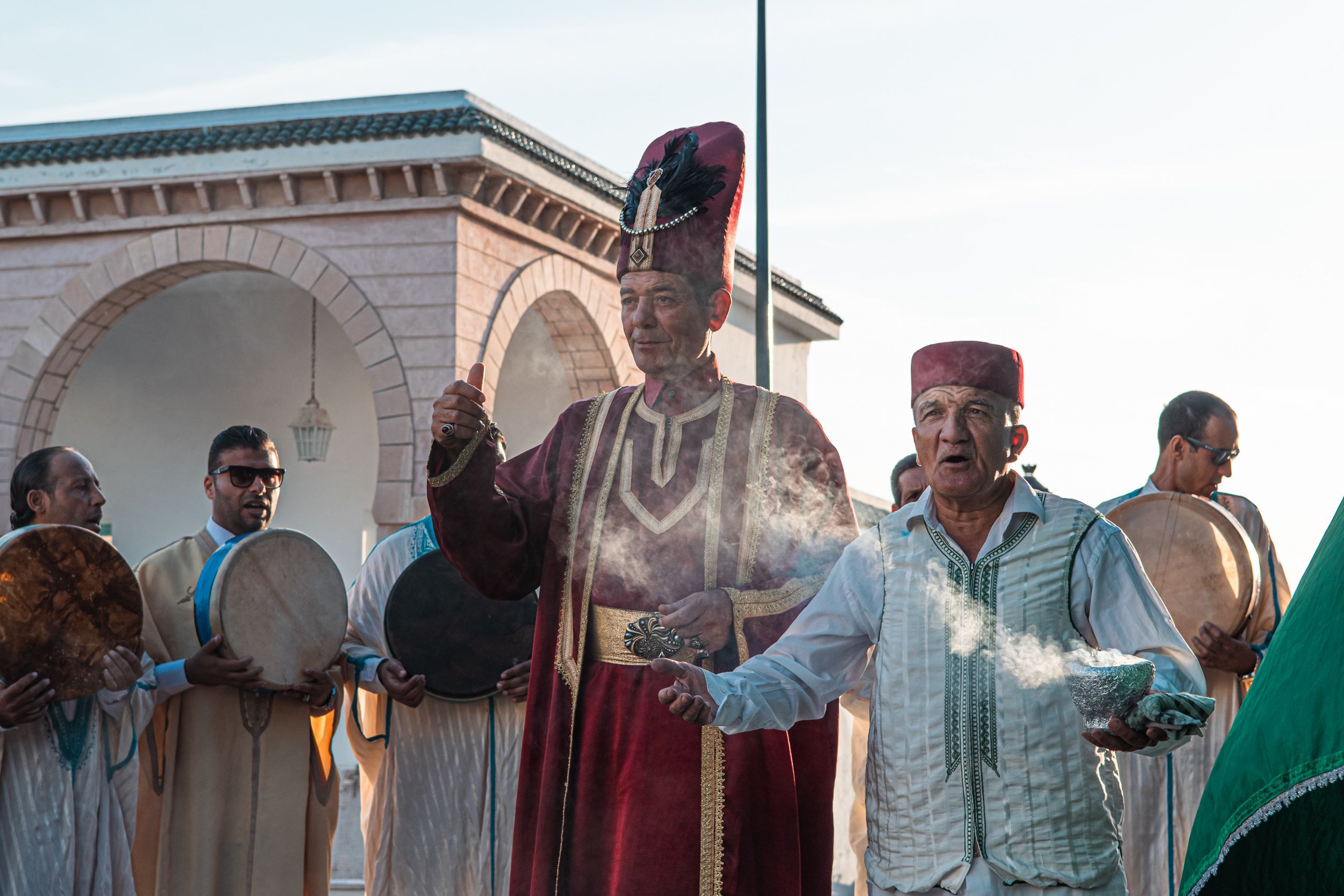 Priest and Men in Traditional Ceremony · Free Stock Photo