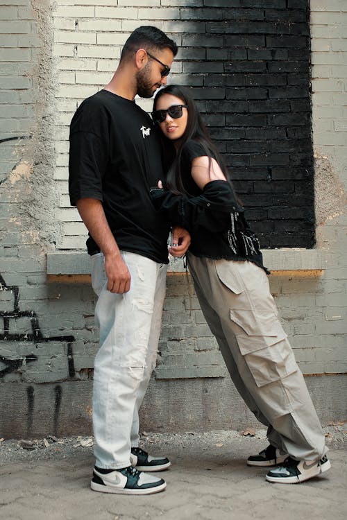 A man and woman standing next to each other