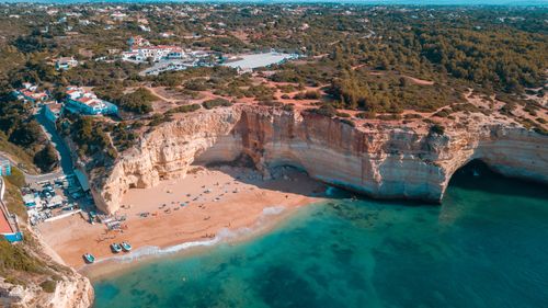 Free A breathtaking aerial view of a cliffside beach in Algarve, Portugal. Stock Photo
