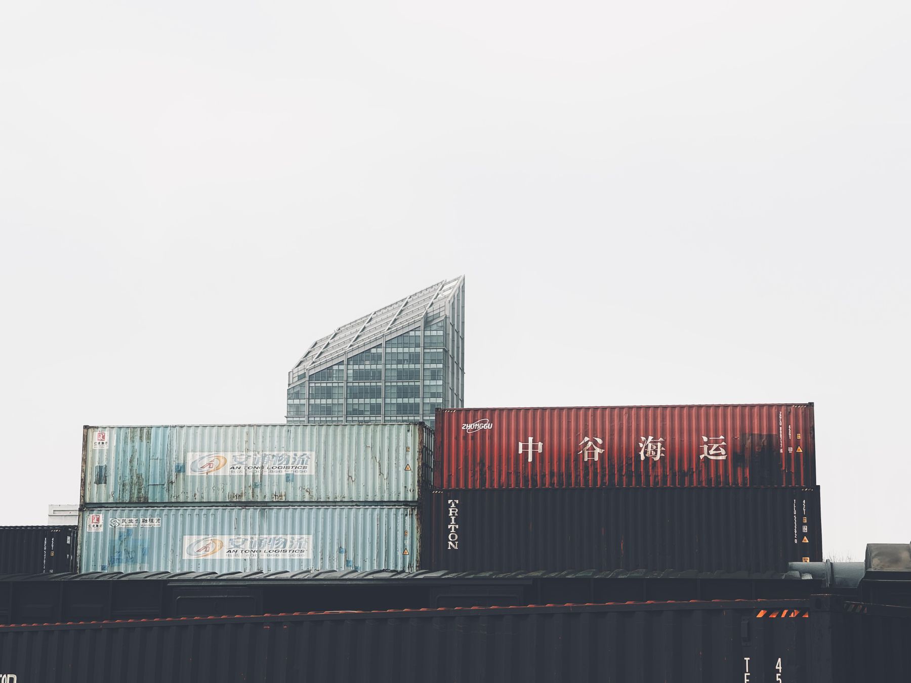 Stacked shipping containers forming modern architecture in an urban setting