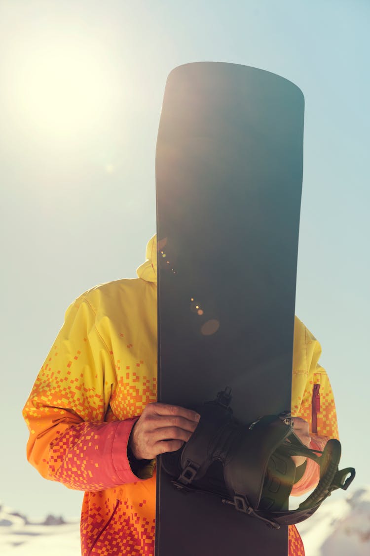 Person Holding Snowboard