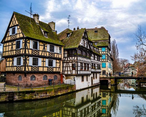 Free Explore the medieval architecture of Strasbourg's picturesque riverfront. Stock Photo