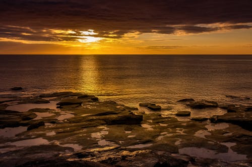 Foto profissional grátis de corroído, costa, mar