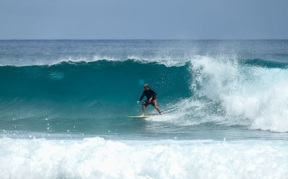 A Surf Person in Surfboard in the Wave during Daytime · Free Stock Photo