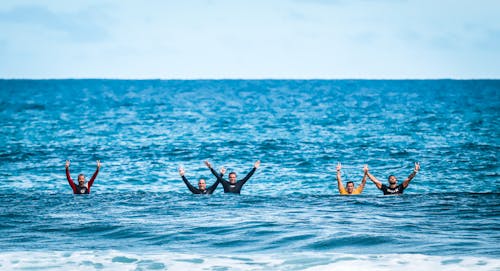 Five Person in the Middle of Ocean