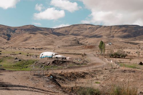Free Picturesque arid landscape with tents in the rural countryside of Van, Türkiye. Stock Photo