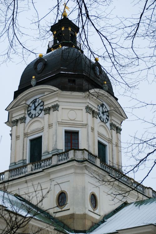 Free Vertical shot of the clock tower of Adolf Fredrik Church in Stockholm, Sweden. Stock Photo