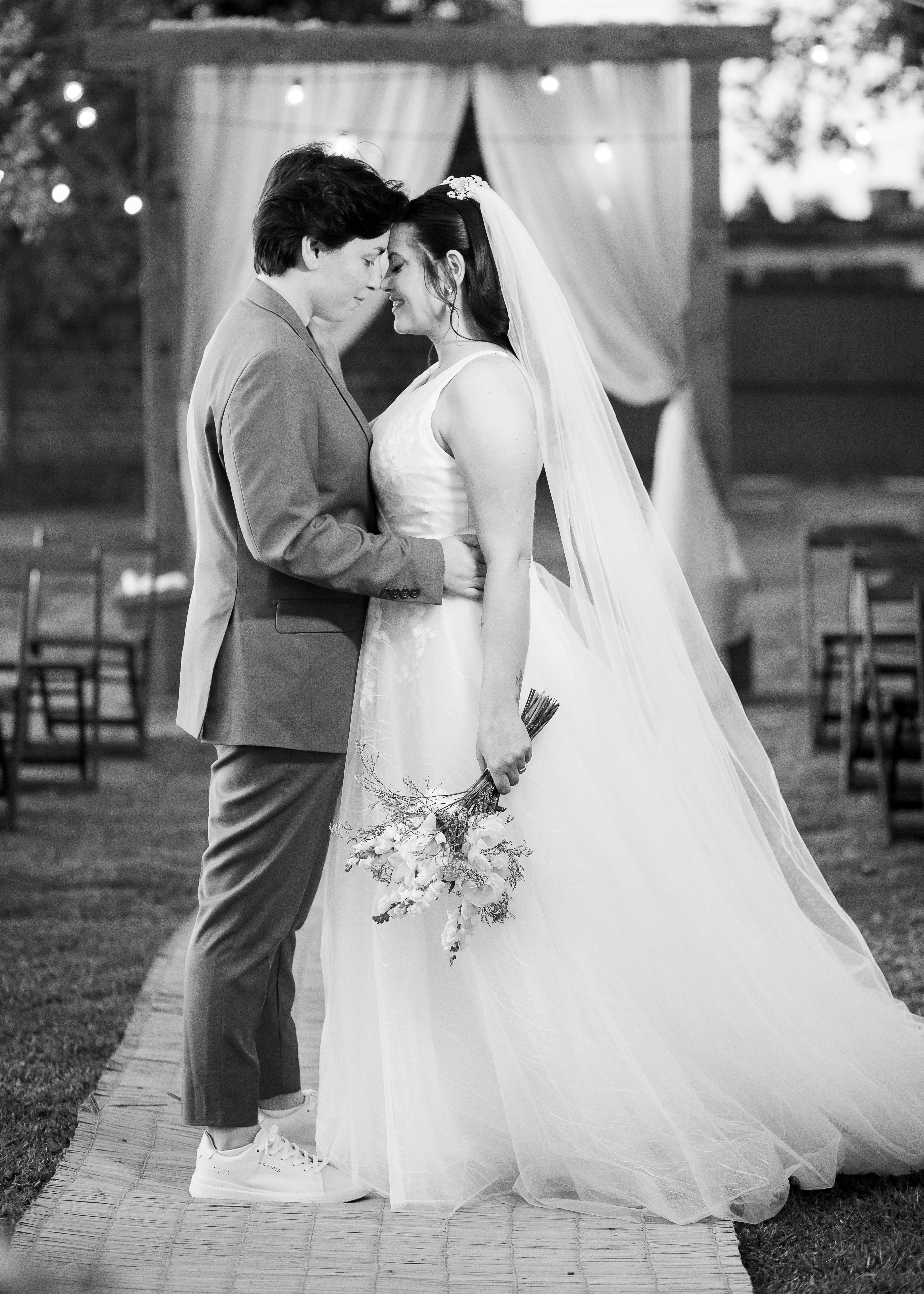 Smiling Newlyweds Hugging in Black and White · Free Stock Photo
