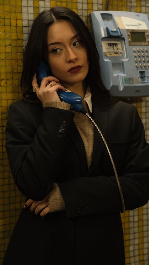 Portrait of Woman with Vintage Telephone