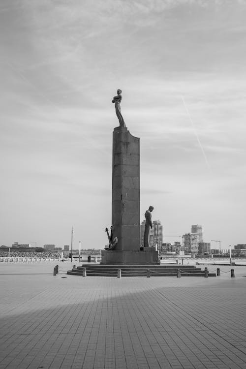 A black and white photo of a statue