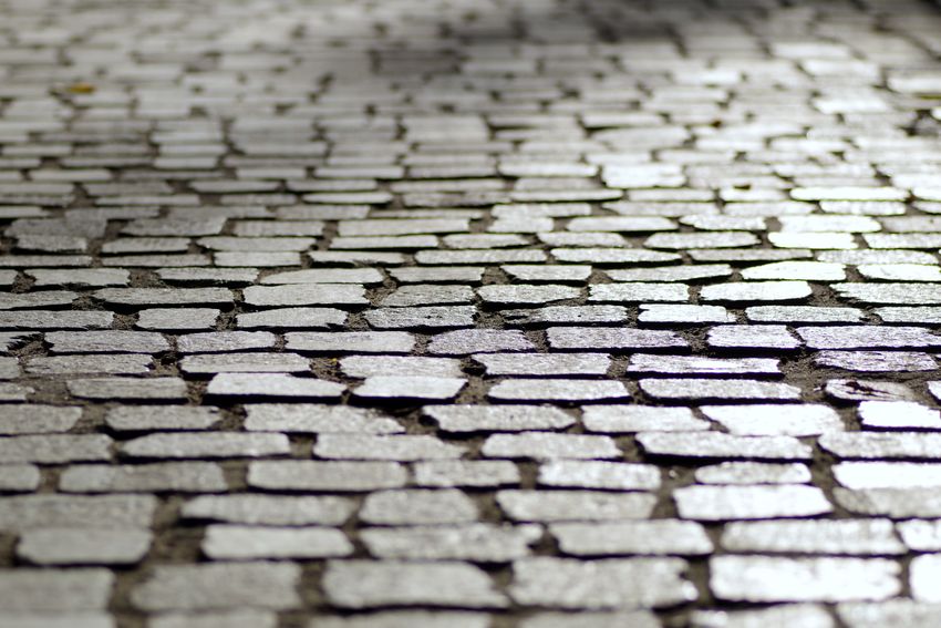 Textured natural stone paving