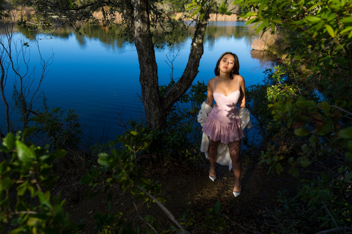 Young Woman Standing Shadows Lake Reflections