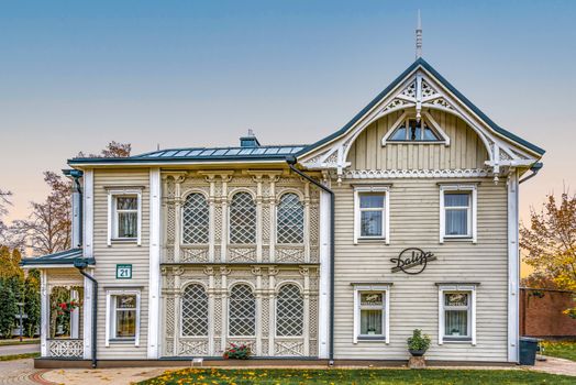 Charming wooden architecture of Hotel Dalija in Druskininkai, a significant local landmark.