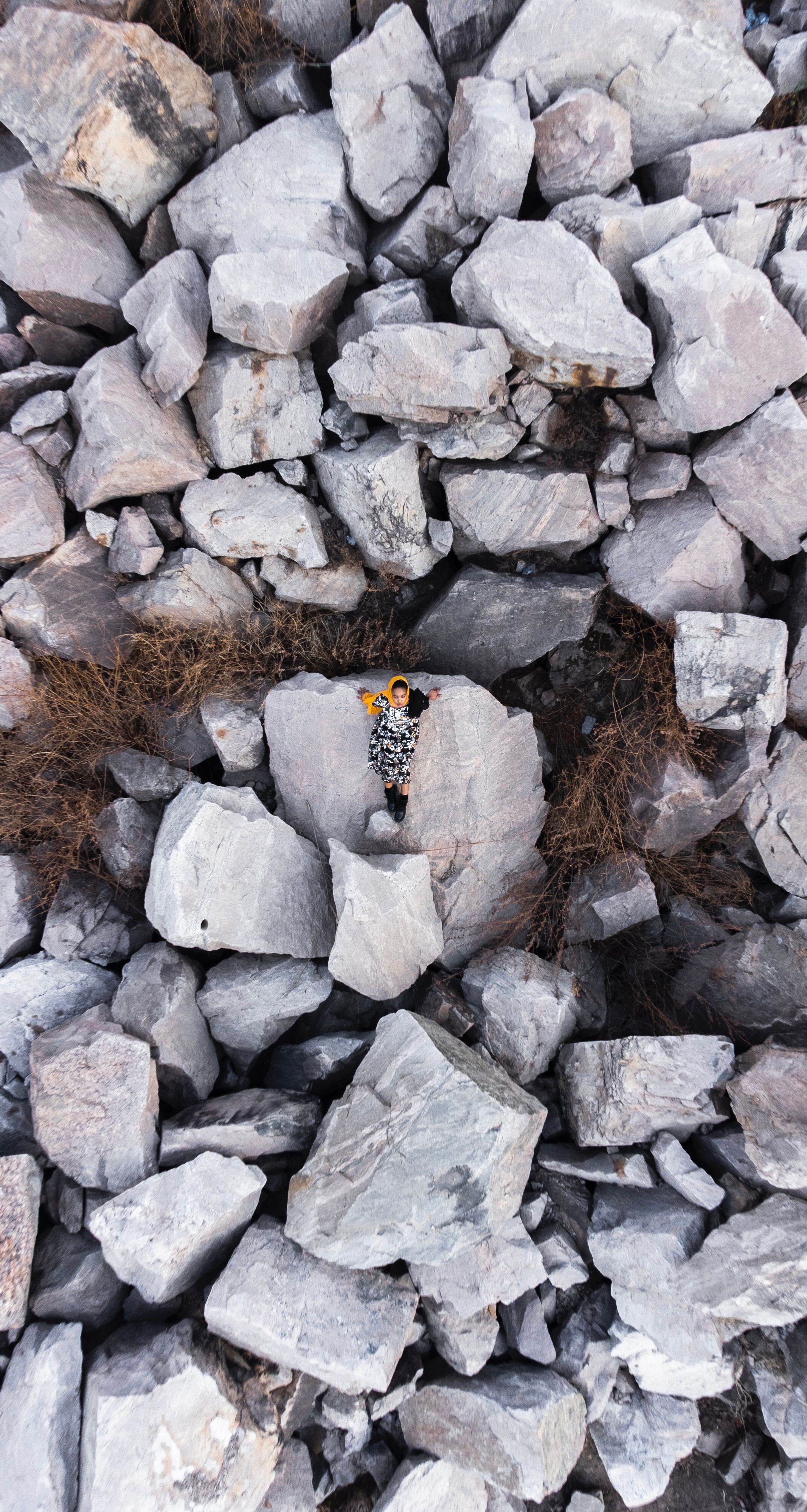 Woman Lying on Rock · Free Stock Photo