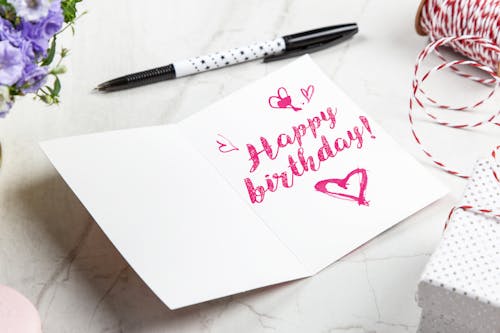 Free Open Birthday Greeting Card Near Pen Stock Photo