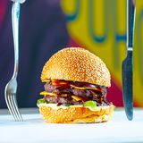 Ember Double Smash burger — photo by ᗩᑎᑌᑭKᑌᗰᎪᏒ PATEL on Pexels