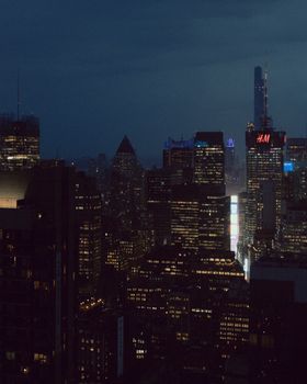 Vibrant New York City skyline illuminated against the night sky.