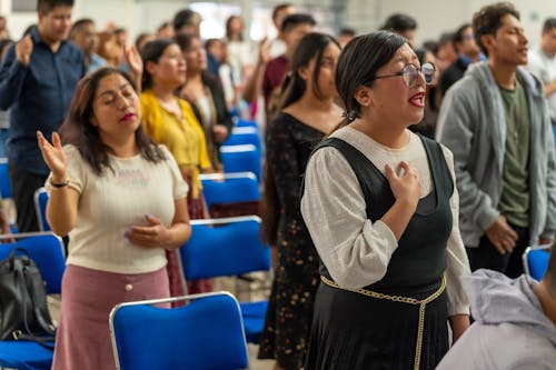 People Praying during Mass