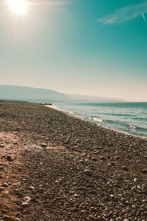 Free Seashore Across Horizon Stock Photo