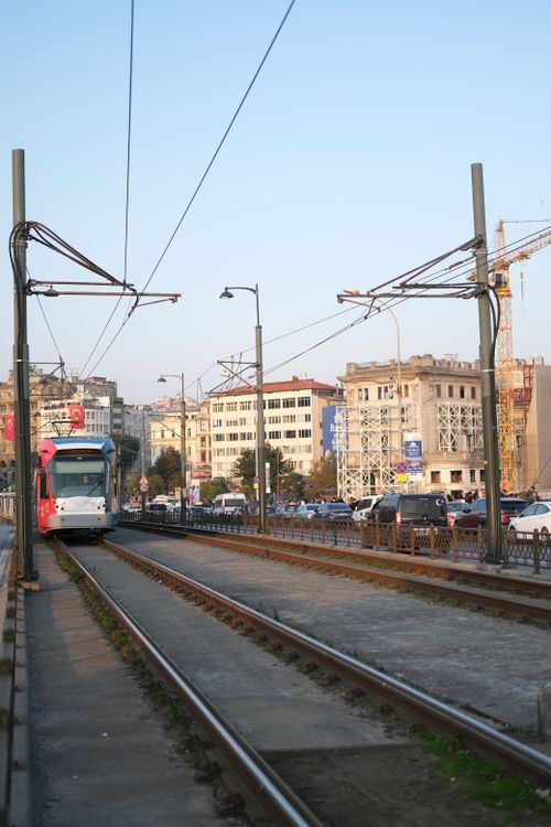 Free Explore the vibrant urban scene with a tram moving through the bustling city of Istanbul, Turkey. Stock Photo