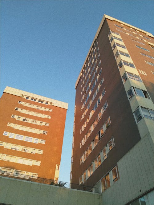 Low-angle Photography of Orange High-rise Buildings