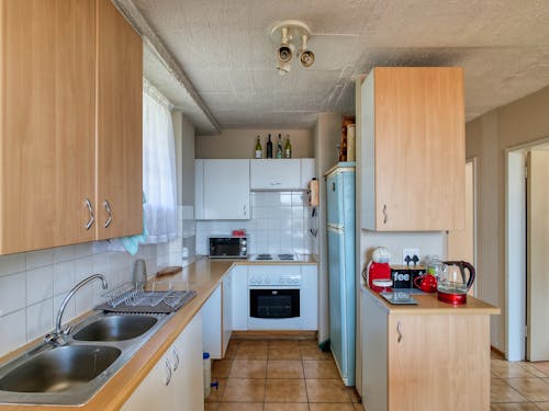 Foto profissional grátis de aço inoxidável, apartamento, armário