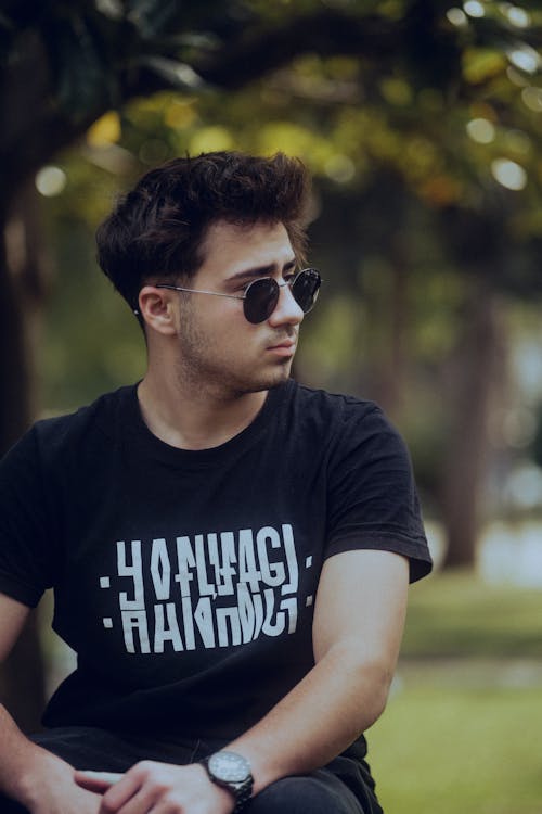 Man in Black T-shirt and Sunglasses