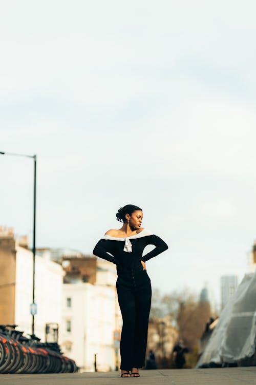 Model in Black Dress in Town