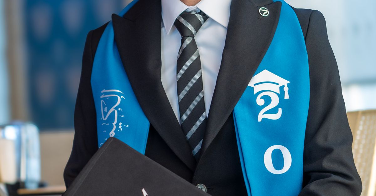 Study Graduate Clothes Smiling Graduate in Black Suit Holding Mortarboard · Free Stock Photo
