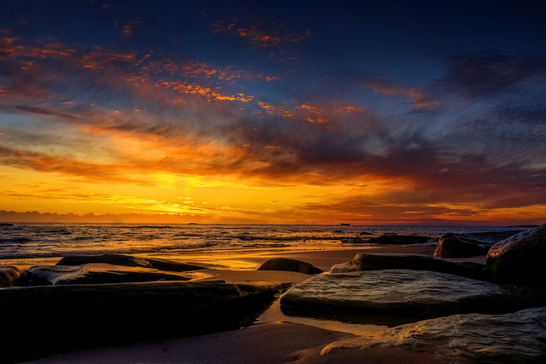 Rocks on Beach at Sunset · Free Stock Photo