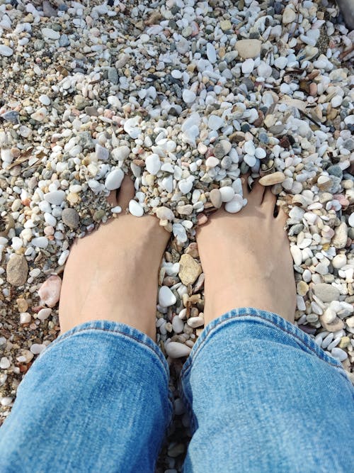 Sinking my toes into the beach pebbles