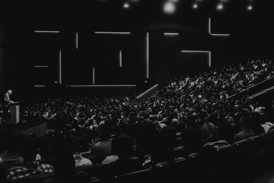 The firm at its annual all-hands, in monochrome — photo by BBSO on Pexels