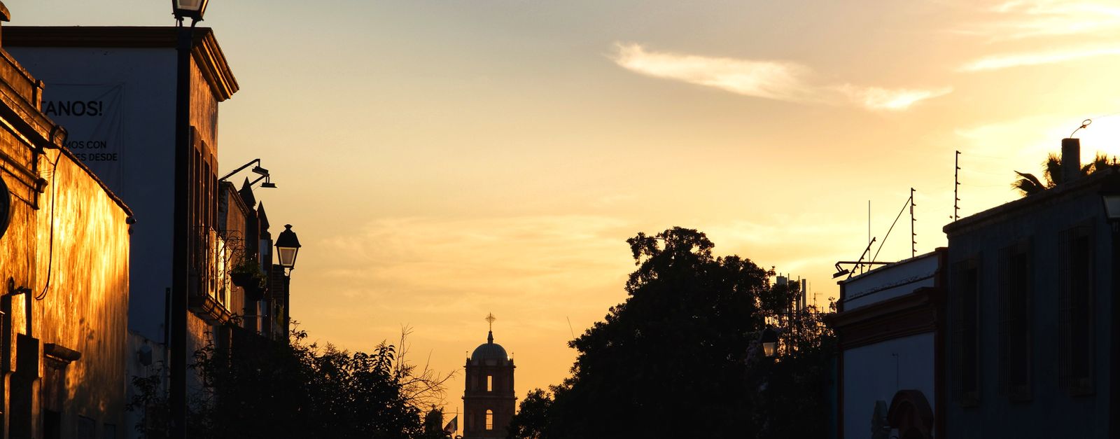 A beautiful sunset over the historic streets of Santiago de Querétaro, Mexico.