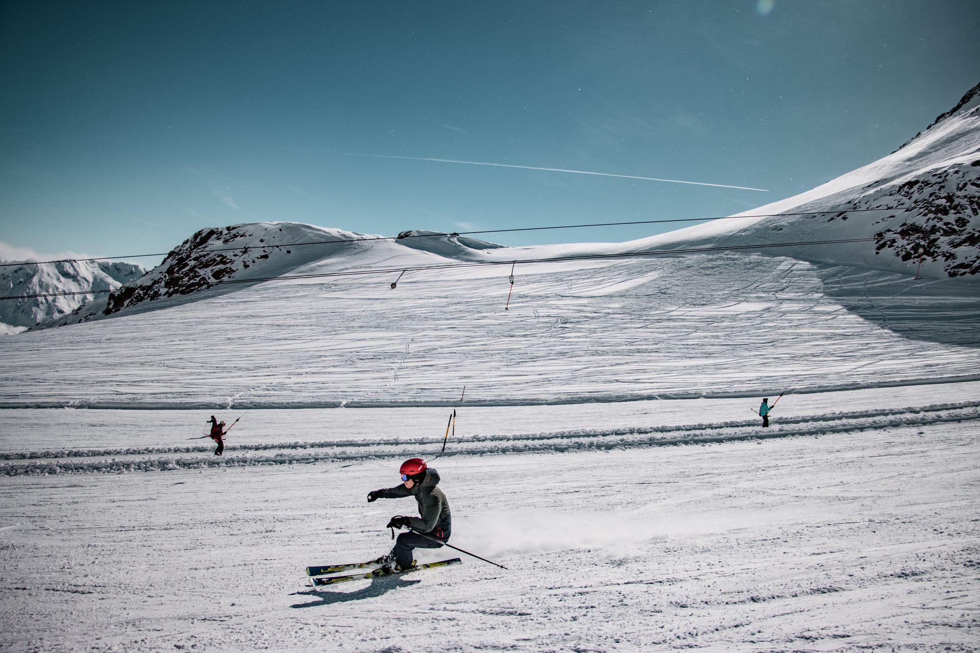 Skiers enjoying a thrilling day on Sölden's snowy slopes in winter.
