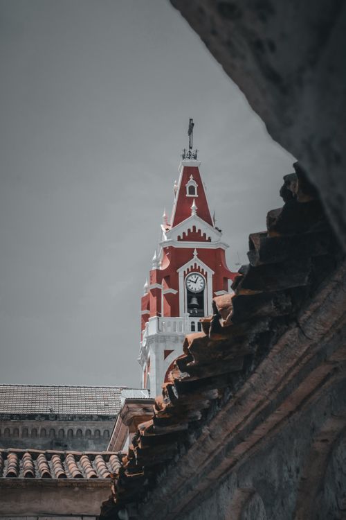 Free A picturesque view of a historical bell tower with a clock in Arequipa, Peru. Stock Photo