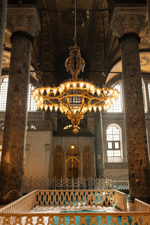 The interior of a building with a chandelier hanging from the ceiling