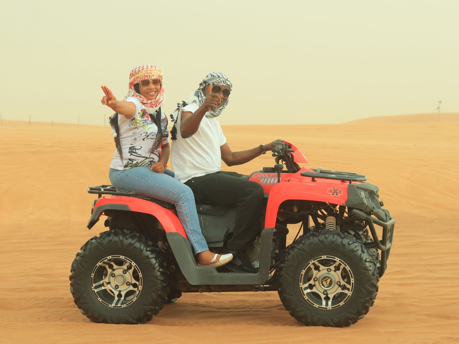 Quad bike convoy kicking up dust