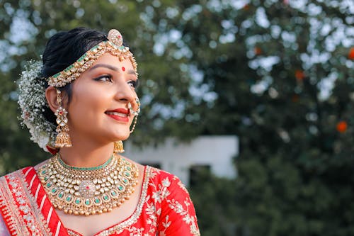 A beautiful indian bride in red and gold