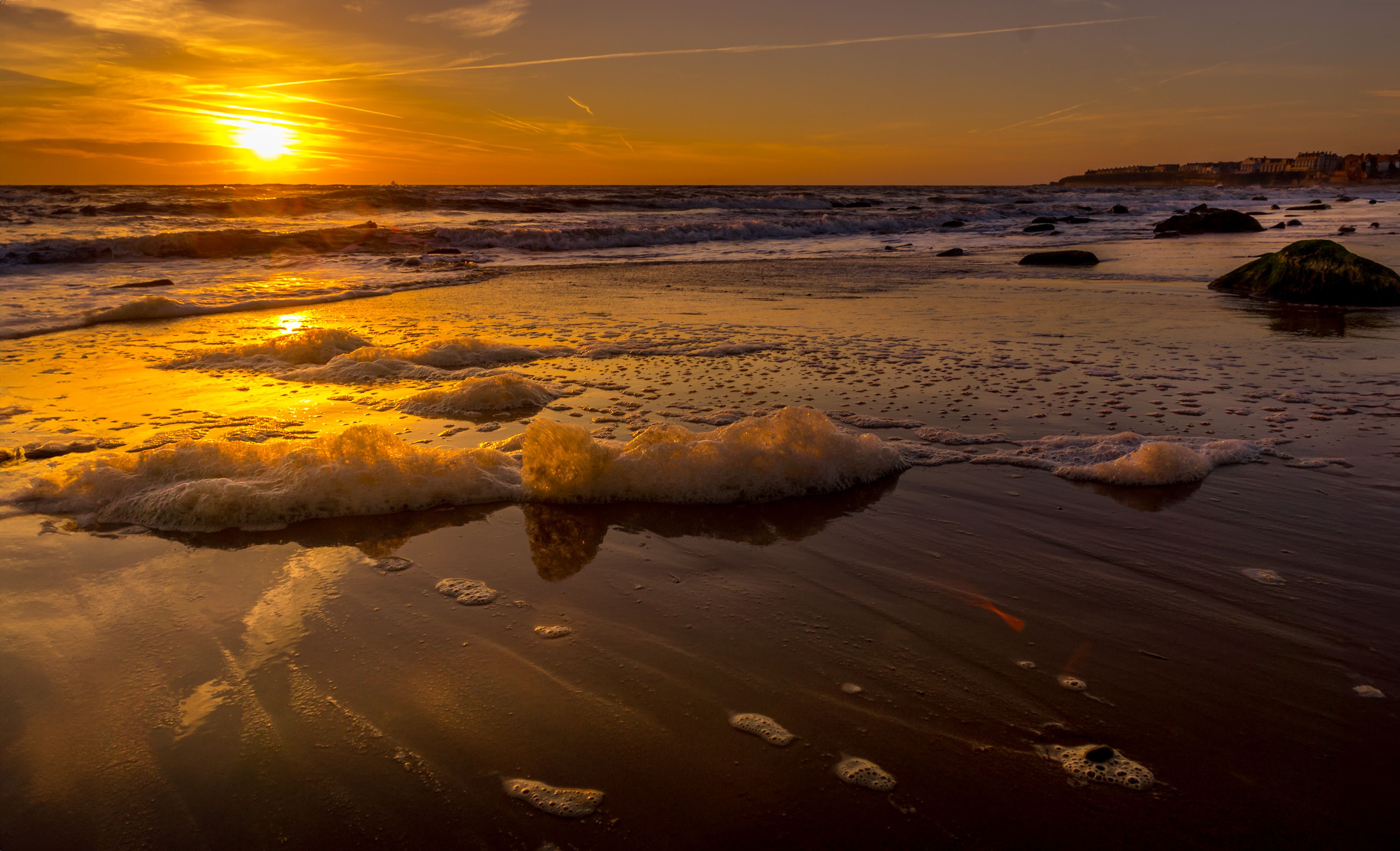 Foam on Sea Shore at Sunset · Free Stock Photo
