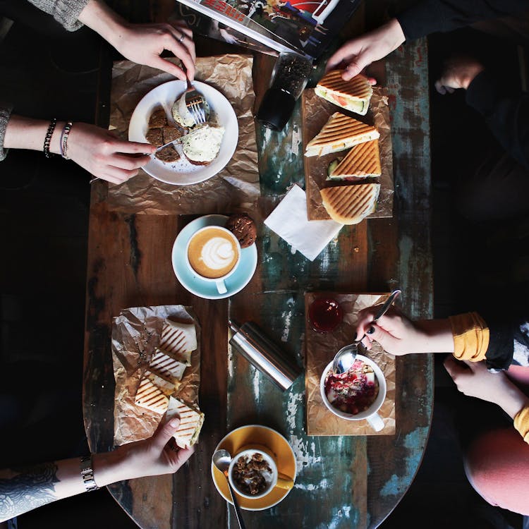 Four People Dining Together