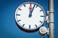 Round Black and Blue Framed Analog Clock