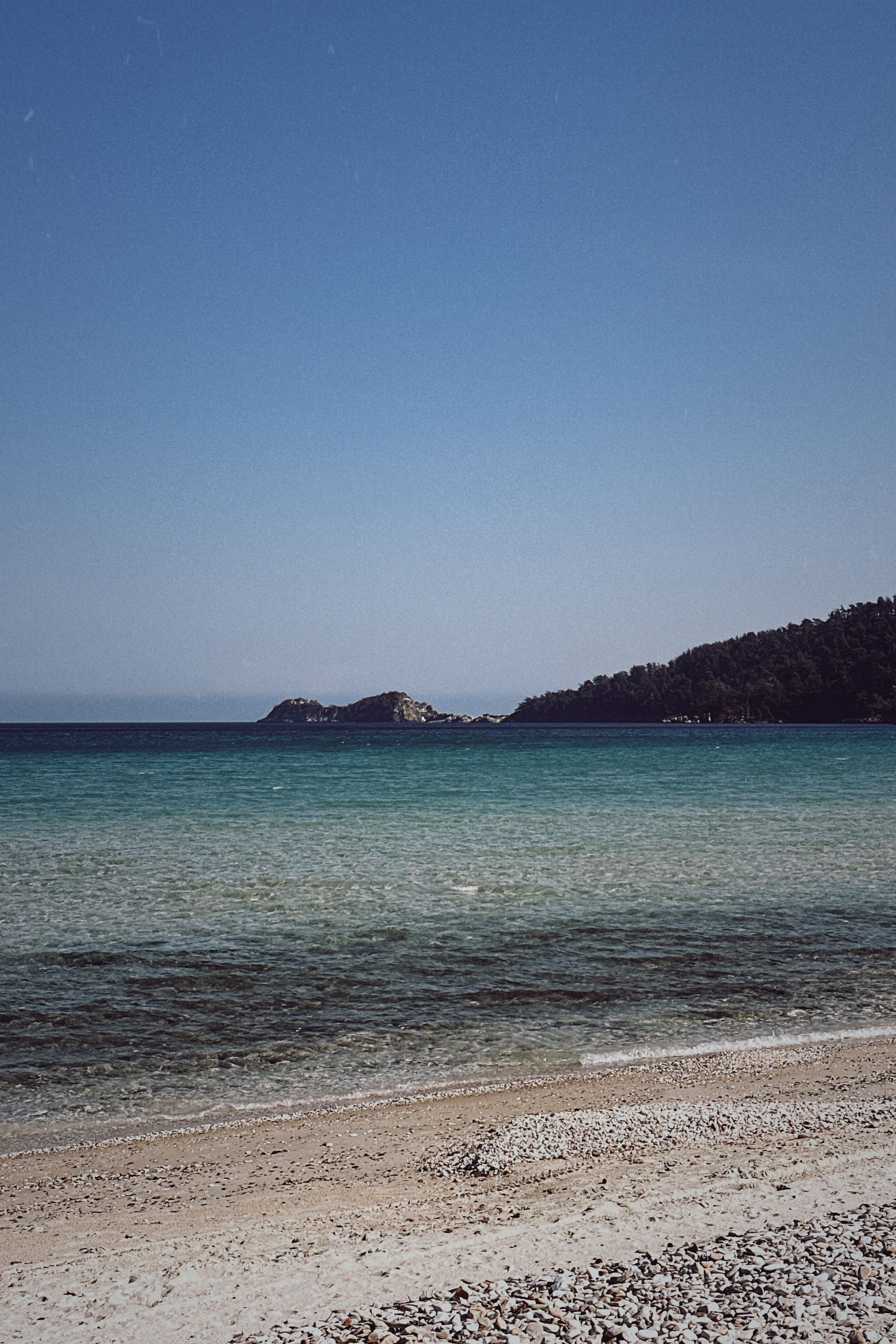blue water beach · Free Stock Photo